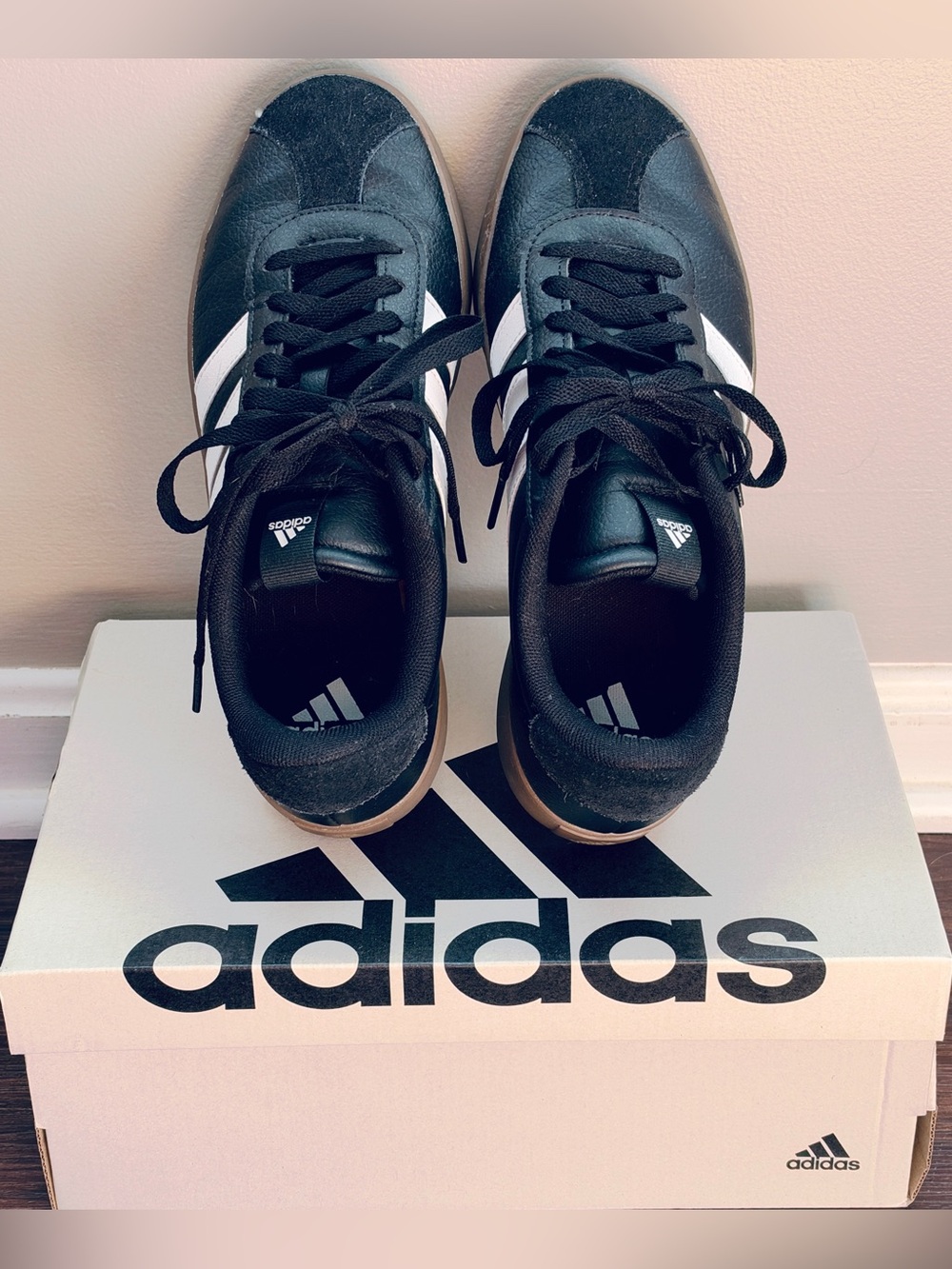 adidas women’s Black Sneakers with White Stripes and Gum Outsole